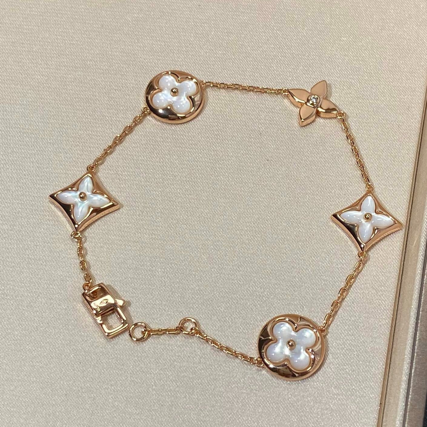 [AuraEcho Jewelry]STAR AND SUN 5 MOTIF MOP PINK GOLD BRACELET